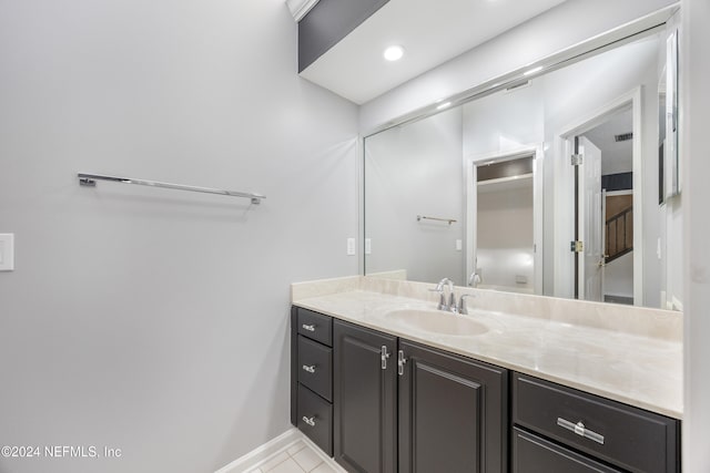 bathroom featuring tile patterned floors and vanity