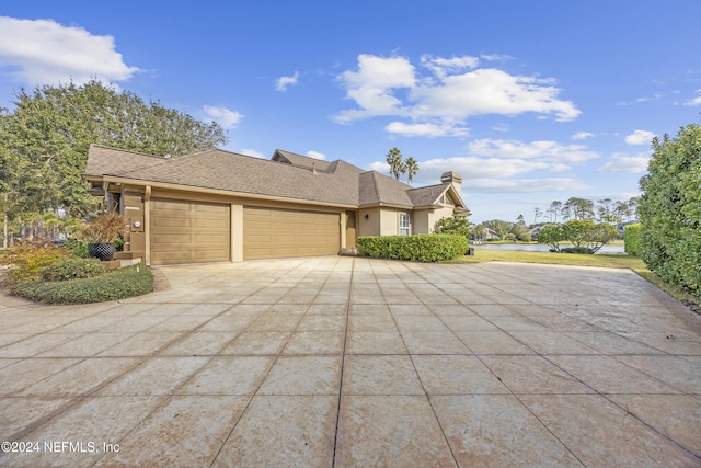 view of front of home with a garage