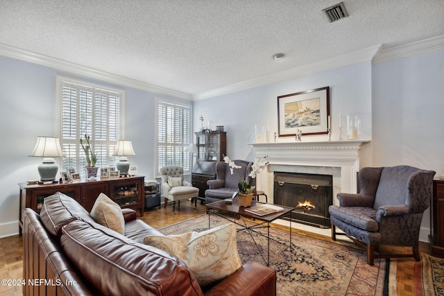 living room featuring a textured ceiling and ornamental molding