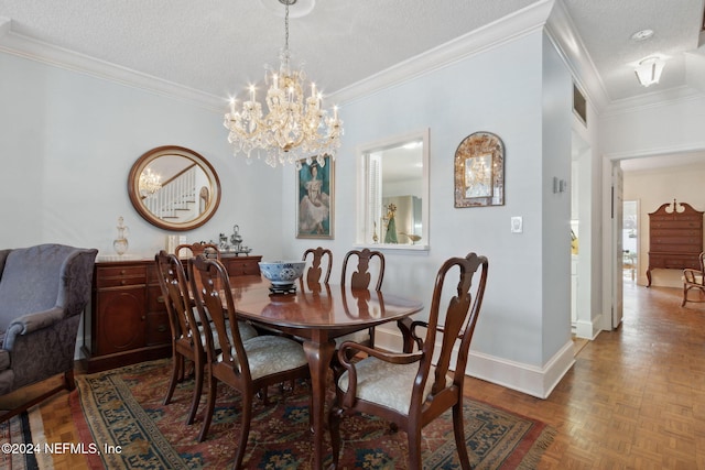 dining area featuring a notable chandelier, ornamental molding, a textured ceiling, and parquet flooring