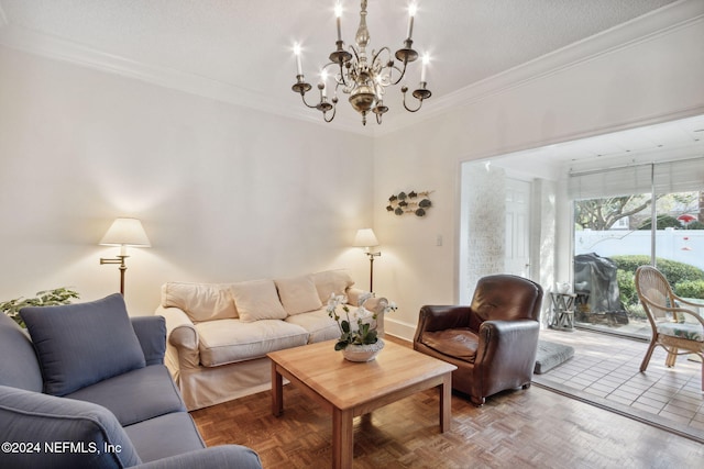 living room featuring ornamental molding, a textured ceiling, parquet floors, and a notable chandelier