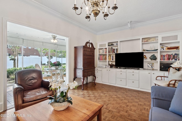 living room featuring ceiling fan with notable chandelier, parquet floors, a textured ceiling, and ornamental molding