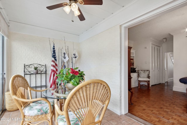 dining room with parquet flooring and ceiling fan