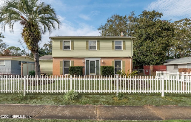 view of front of property with a front yard