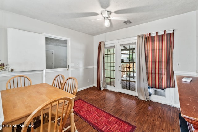 dining space featuring french doors, a textured ceiling, ceiling fan, and wood-type flooring