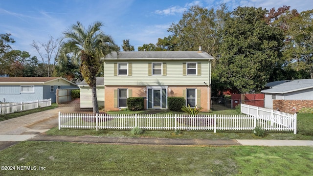 view of front of house with a front yard