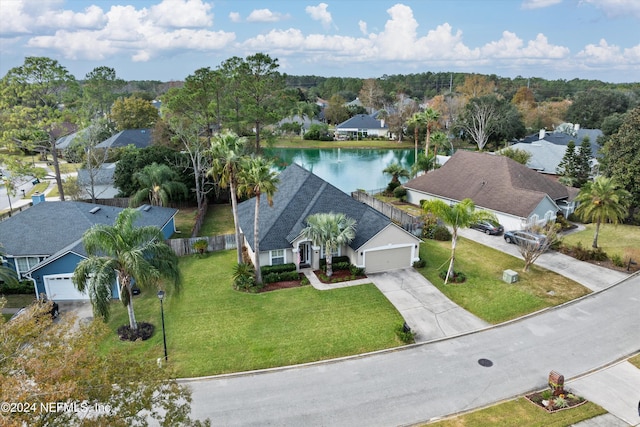 drone / aerial view with a water view