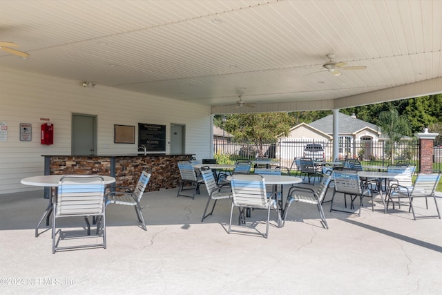 view of patio featuring ceiling fan