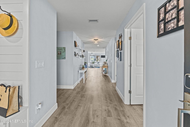 hall featuring light wood-type flooring