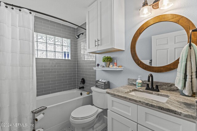 full bathroom with vanity, toilet, and shower / bathtub combination with curtain