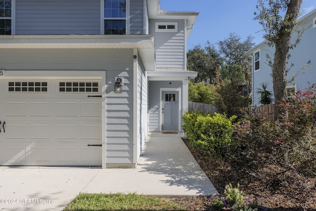 property entrance featuring a garage