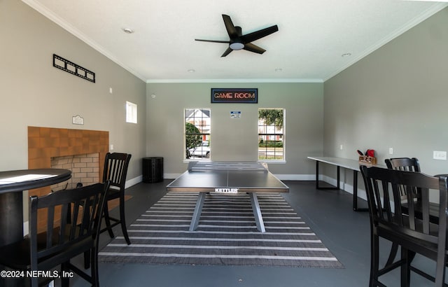 recreation room with crown molding and ceiling fan