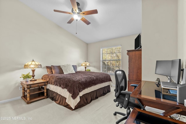 carpeted bedroom with vaulted ceiling and ceiling fan