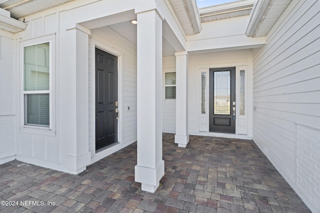 entrance to property with a porch