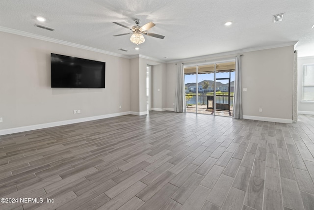 unfurnished living room with ceiling fan, light hardwood / wood-style flooring, crown molding, and a textured ceiling