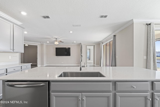 kitchen with stainless steel dishwasher, ceiling fan, gray cabinetry, and ornamental molding