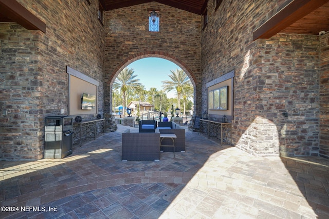 view of patio featuring an outdoor kitchen and an outdoor hangout area