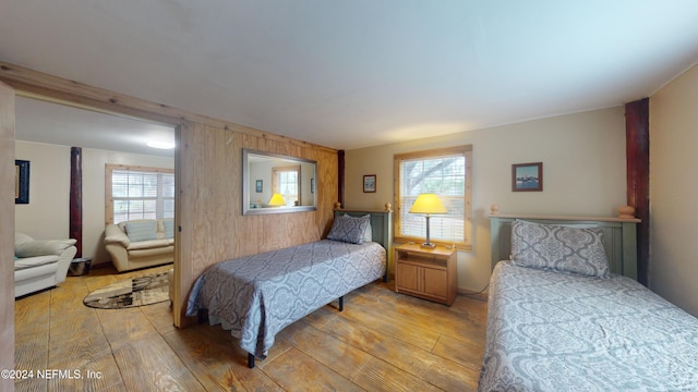 bedroom with light wood-type flooring