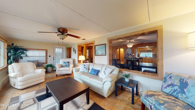 living room featuring ceiling fan