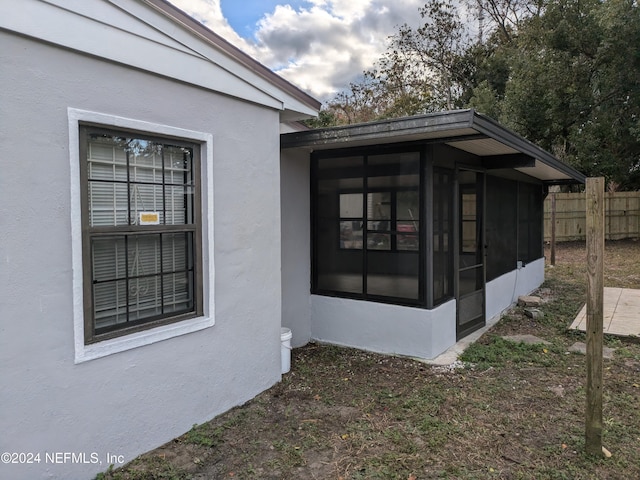 exterior space with a sunroom