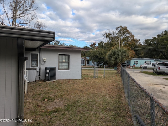 view of yard featuring central AC