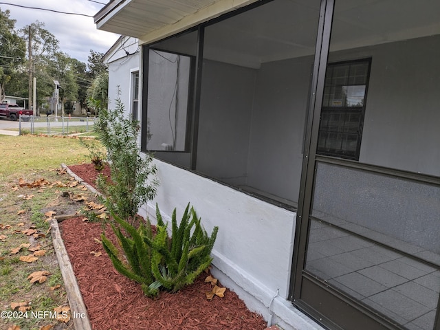 view of home's exterior featuring a sunroom