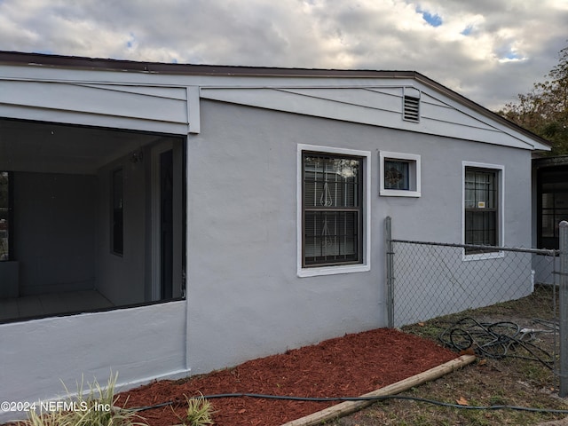 exterior space with a sunroom