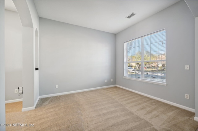 view of carpeted spare room