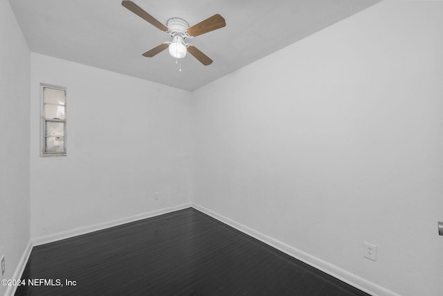 empty room featuring hardwood / wood-style flooring and ceiling fan