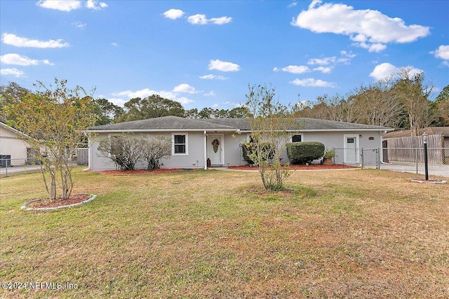 ranch-style house featuring a front lawn