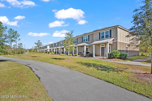 view of front of home with a front yard