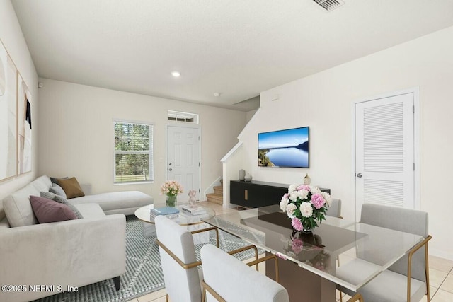 living room with light tile patterned floors