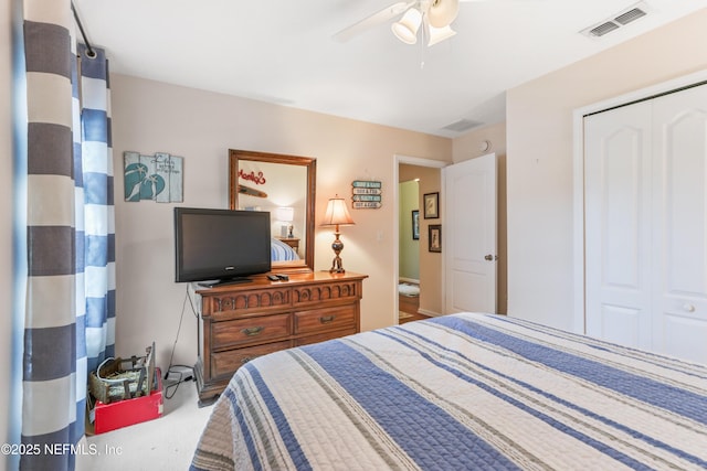 bedroom featuring ceiling fan, a closet, and connected bathroom