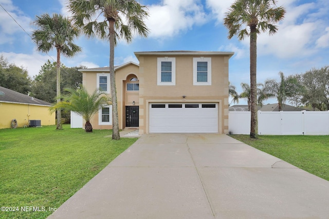 view of front of home with a garage, central air condition unit, and a front yard