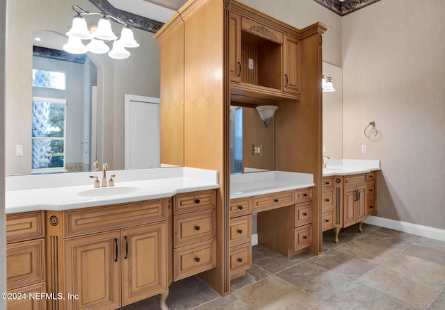 bathroom featuring vanity and a chandelier