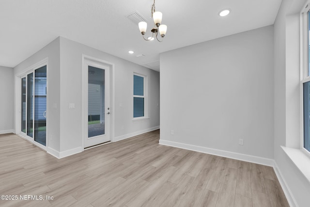 118 Caiden Dr, Ponte Vedra, FL 32081 - empty room featuring a chandelier, light wood-style floors, recessed lighting, and baseboards