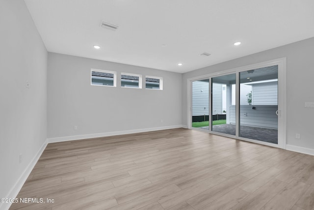 118 Caiden Dr, Ponte Vedra, FL 32081 - empty room featuring light wood-style floors, plenty of natural light, baseboards, and recessed lighting
