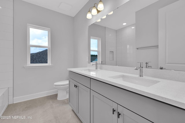 118 Caiden Dr, Ponte Vedra, FL 32081 - bathroom with double vanity, baseboards, toilet, a shower, and tile patterned floors