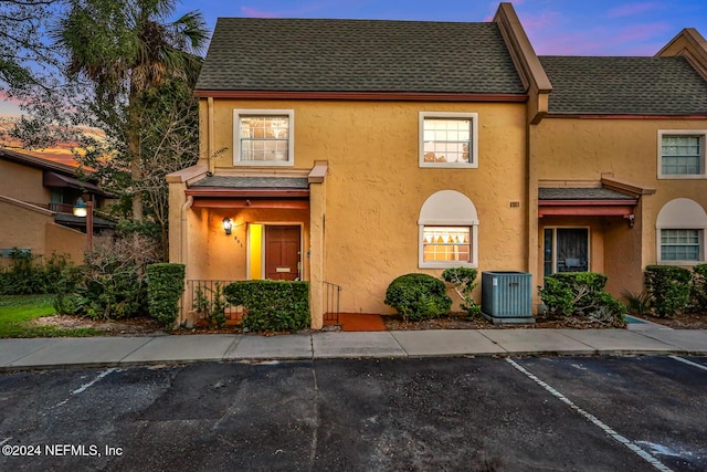 view of front of property with central AC