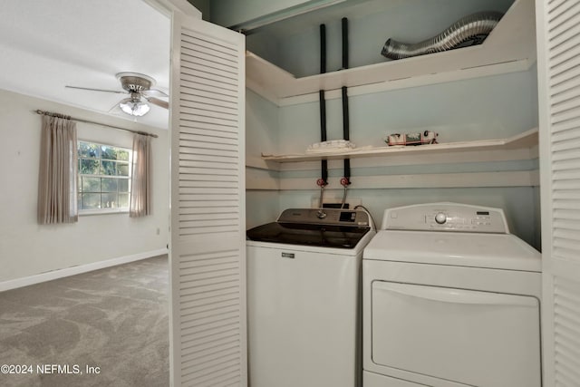 laundry area featuring light colored carpet, ceiling fan, and washing machine and clothes dryer