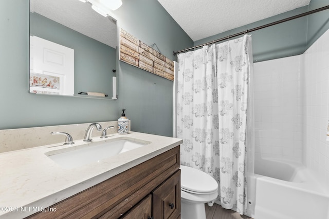 full bathroom with vanity, toilet, a textured ceiling, and shower / bath combo with shower curtain