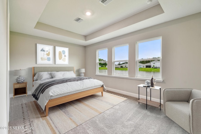 75484 Banyan Way, Yulee, FL 32097 - carpeted bedroom with baseboards and a tray ceiling