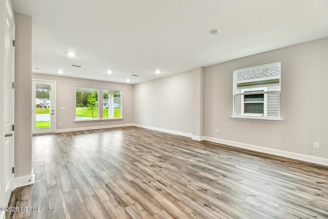 75484 Banyan Way, Yulee, FL 32097 - empty room with wood finished floors, baseboards, and recessed lighting