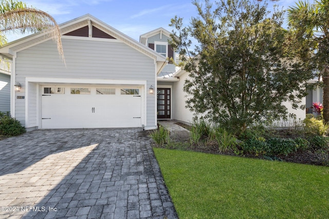 84 Waterline Dr, Saint Johns, FL 32259 - view of front of house featuring a front yard and a garage