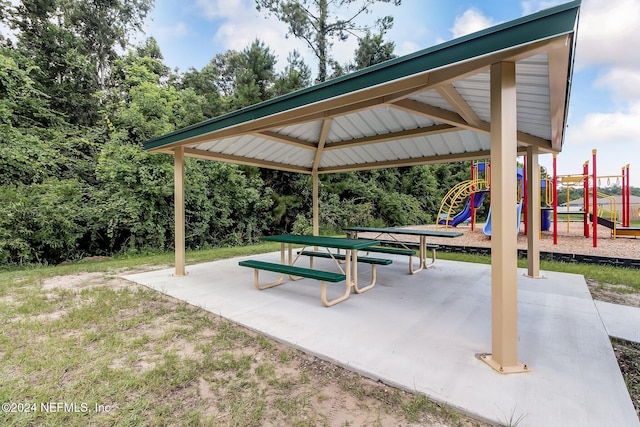 view of property's community featuring a playground