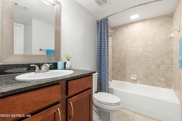 full bathroom with tile patterned floors, toilet, shower / bathtub combination with curtain, and visible vents