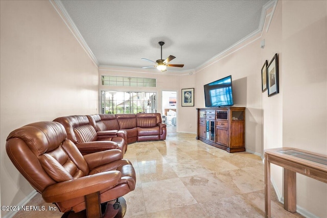 living room featuring a textured ceiling, ceiling fan, and crown molding