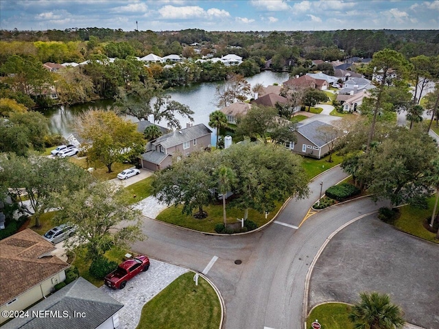 birds eye view of property with a residential view and a water view