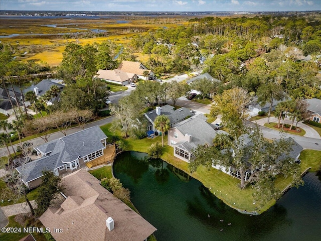 drone / aerial view with a water view