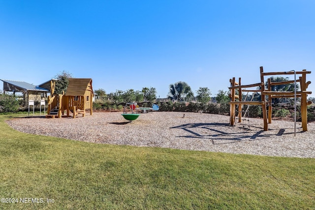 view of play area featuring a lawn